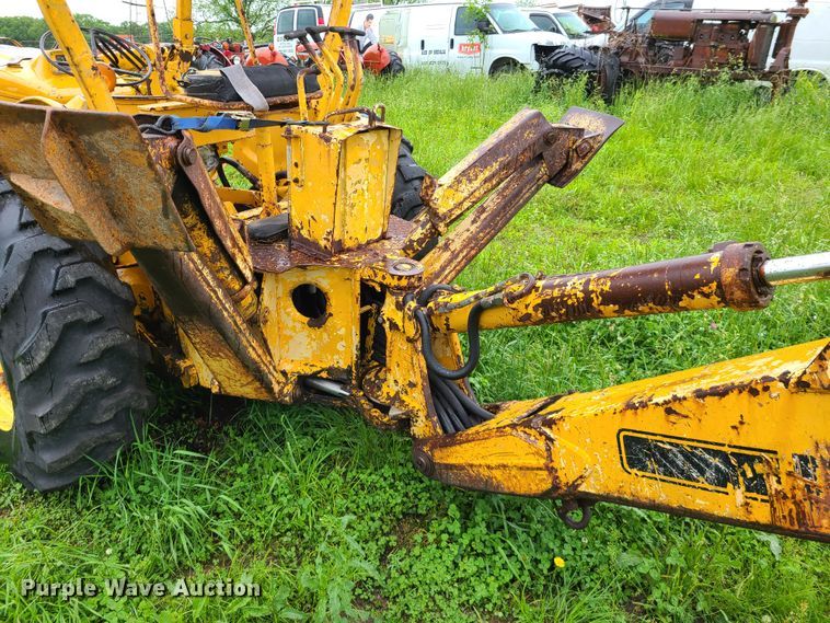 image for item IQ9180 Ford  backhoe