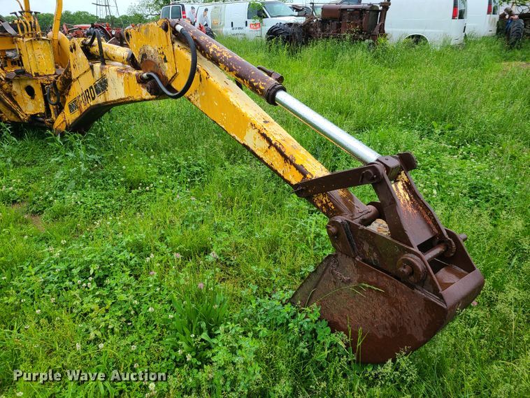 image for item IQ9180 Ford  backhoe