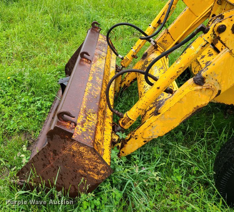 image for item IQ9180 Ford  backhoe