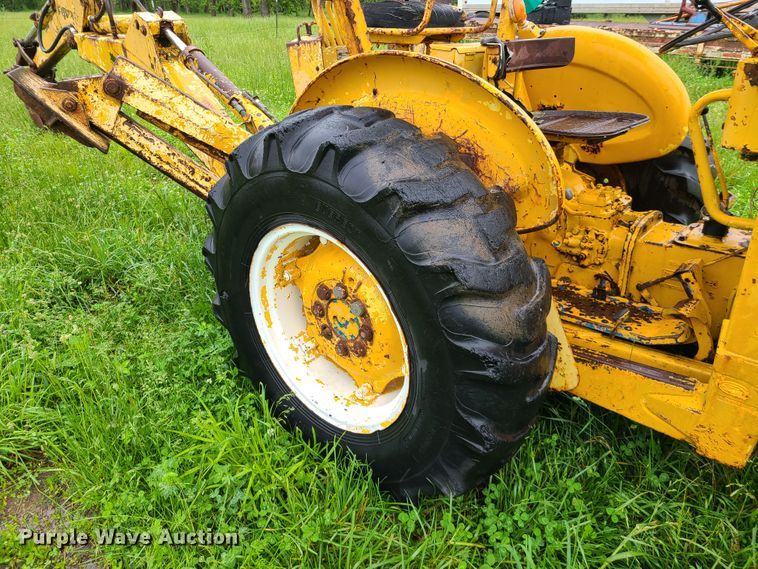 image for item IQ9180 Ford  backhoe