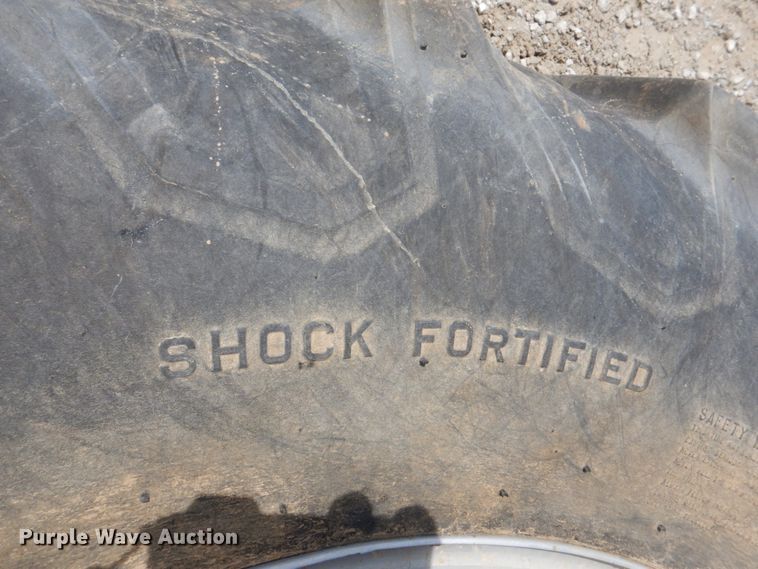 image for item DL0035 18.4-30 Firestone tire and wheel