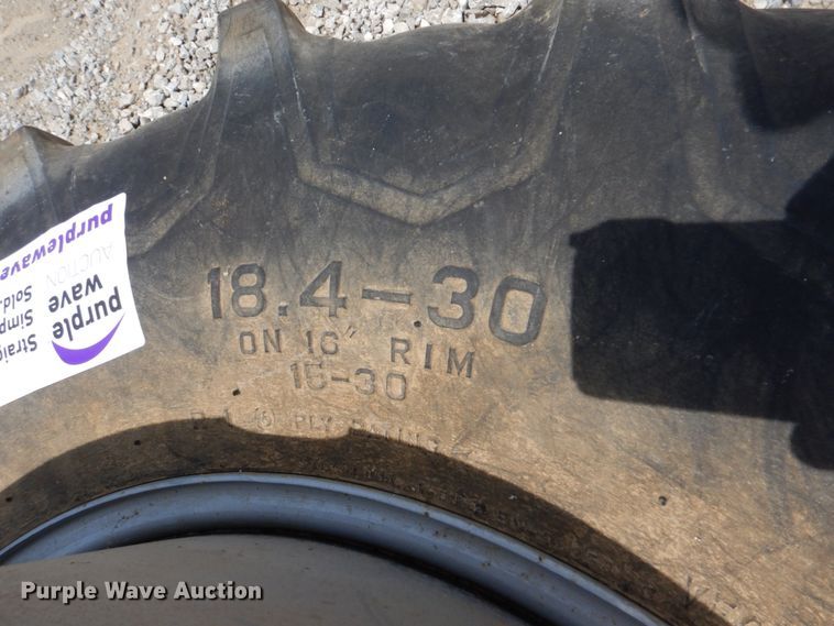 image for item DL0035 18.4-30 Firestone tire and wheel