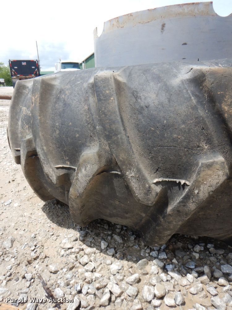 image for item DL0035 18.4-30 Firestone tire and wheel