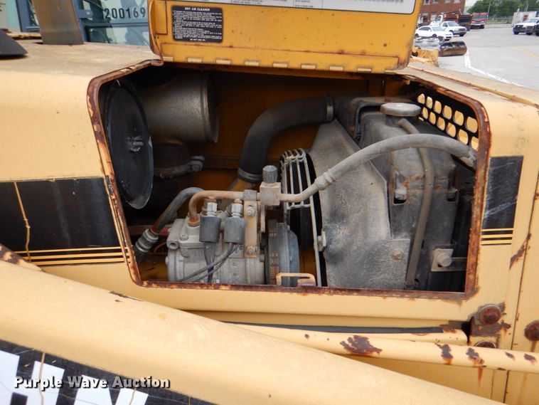 image for item IA9828 1994 John Deere 310D  backhoe