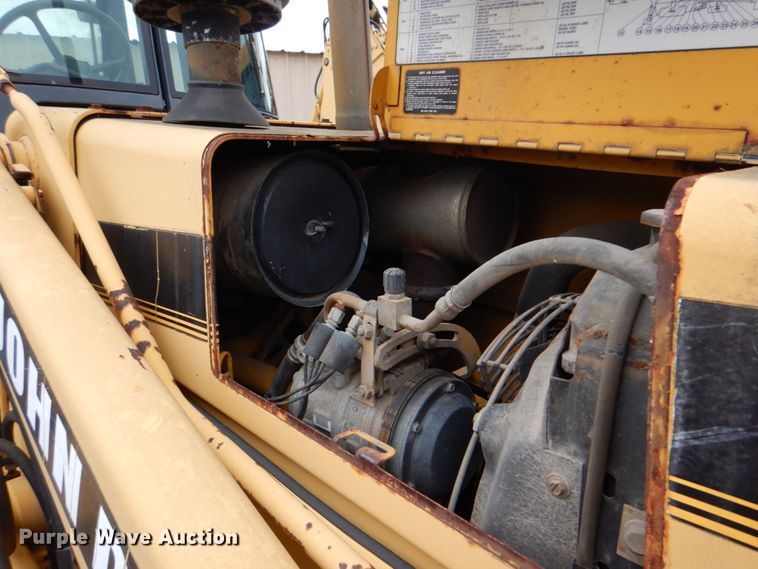 image for item IA9828 1994 John Deere 310D  backhoe