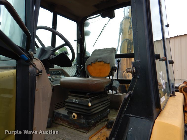 image for item IA9828 1994 John Deere 310D  backhoe