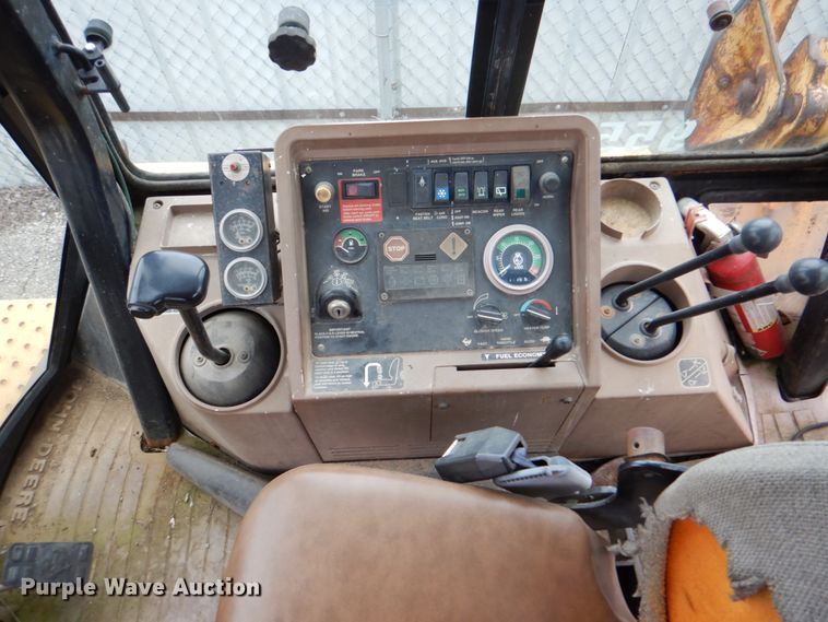 image for item IA9828 1994 John Deere 310D  backhoe