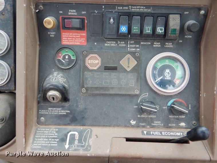 image for item IA9828 1994 John Deere 310D  backhoe