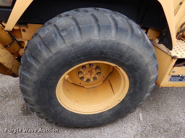 image for item IA9828 1994 John Deere 310D  backhoe