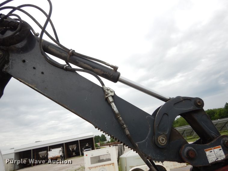 image for item IL9429 2011 John Deere 310SJ  backhoe