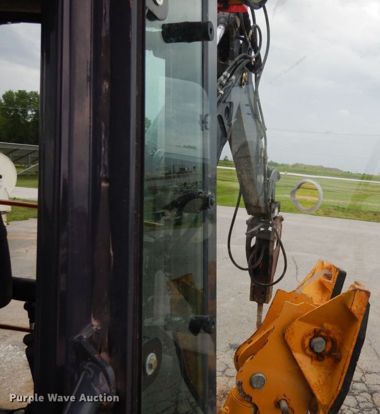 image for item IL9429 2011 John Deere 310SJ  backhoe