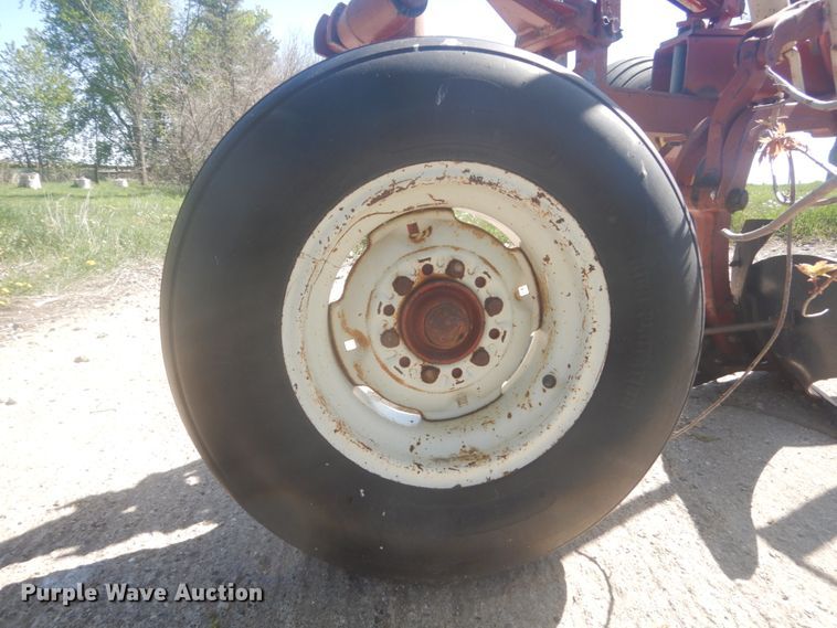 image for item HE9716 International 710  seven bottom plow