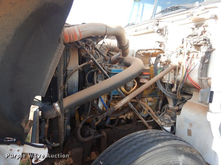 image for item HS9686 1993 White GMC WCM  semi truck