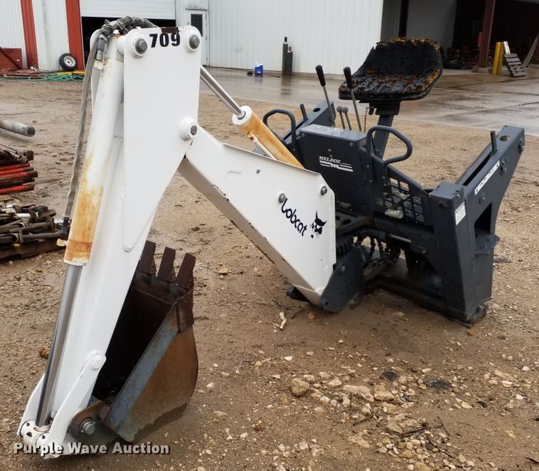 image for item ID9834 Bobcat 709 skid steer backhoe