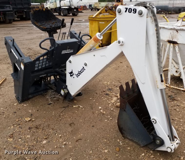image for item ID9834 Bobcat 709 skid steer backhoe