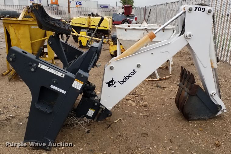 image for item ID9834 Bobcat 709 skid steer backhoe