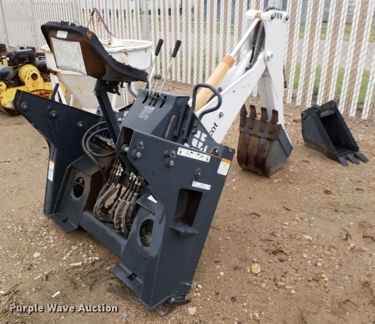 image for item ID9834 Bobcat 709 skid steer backhoe