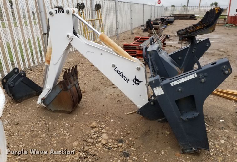 image for item ID9834 Bobcat 709 skid steer backhoe