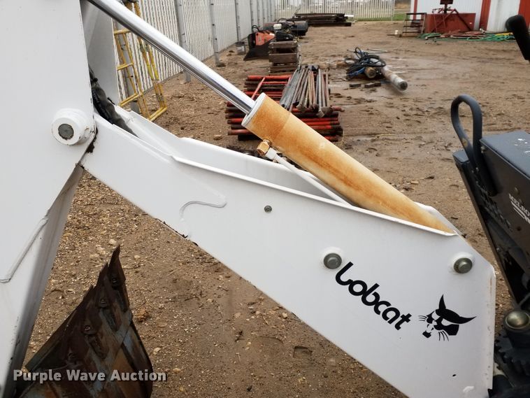 image for item ID9834 Bobcat 709 skid steer backhoe