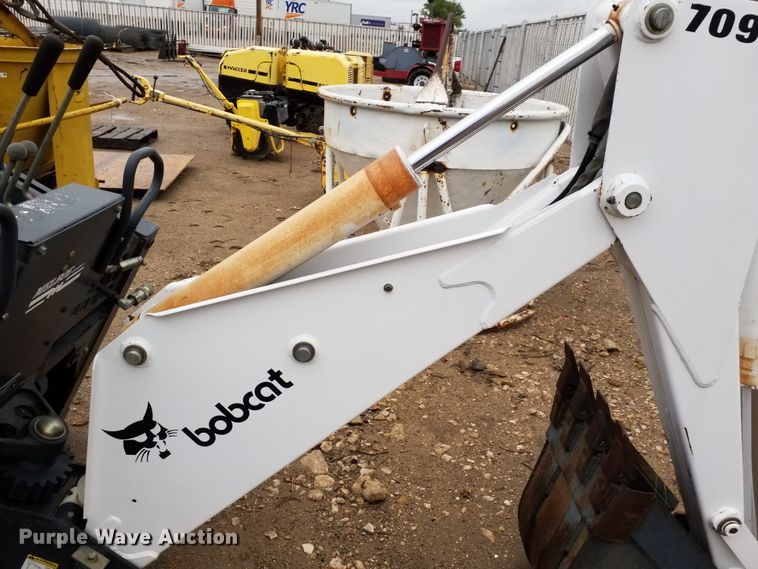 image for item ID9834 Bobcat 709 skid steer backhoe