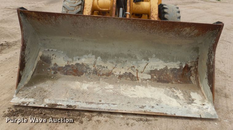 image for item DL0281 2003 John Deere 710G  backhoe