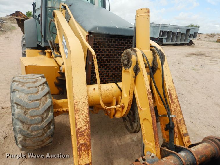 image for item DL0281 2003 John Deere 710G  backhoe
