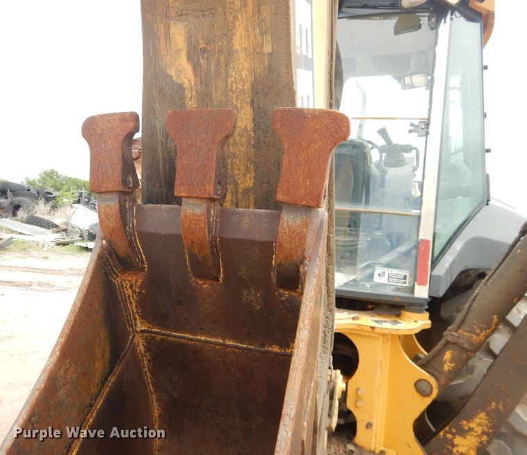 image for item DL0281 2003 John Deere 710G  backhoe