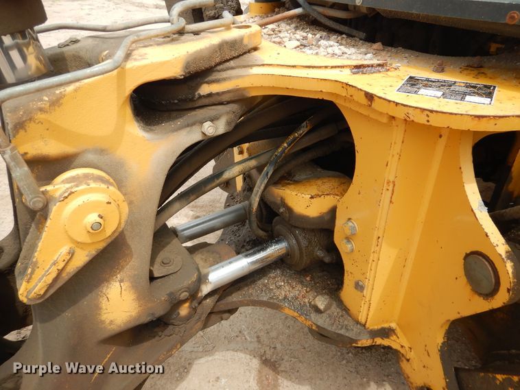 image for item DL0281 2003 John Deere 710G  backhoe