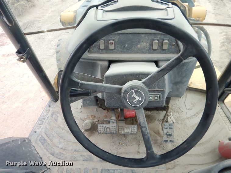 image for item DL0281 2003 John Deere 710G  backhoe