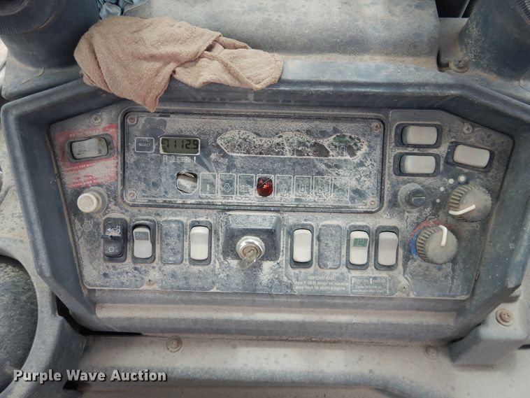 image for item DL0281 2003 John Deere 710G  backhoe