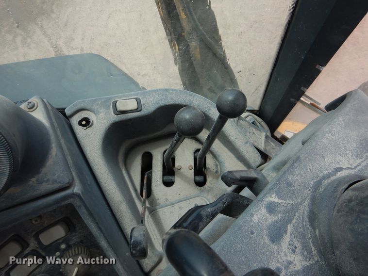 image for item DL0281 2003 John Deere 710G  backhoe