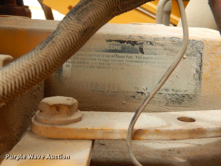 image for item DL0281 2003 John Deere 710G  backhoe