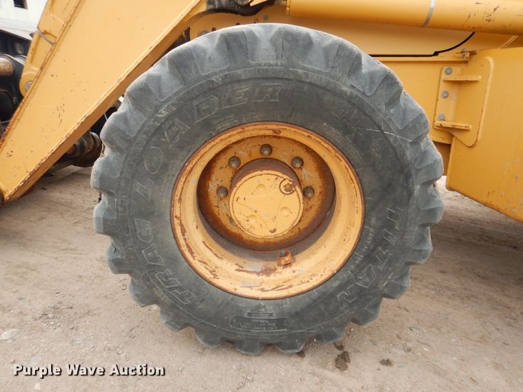 image for item DL0281 2003 John Deere 710G  backhoe