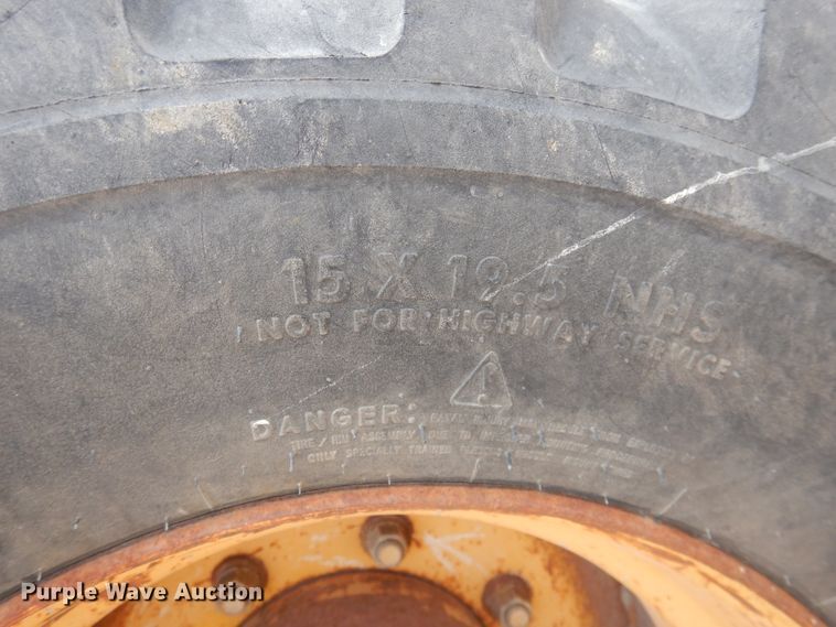 image for item DL0281 2003 John Deere 710G  backhoe