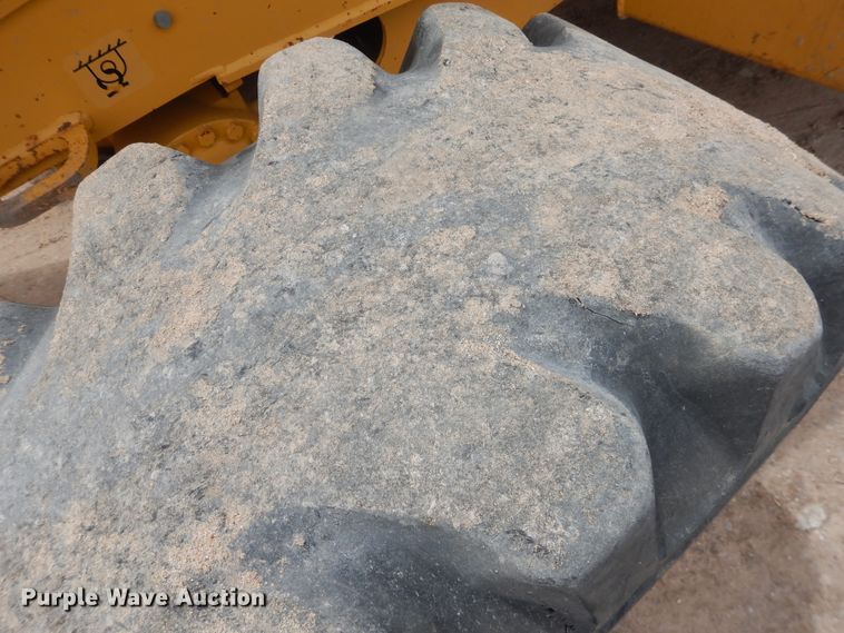 image for item DL0281 2003 John Deere 710G  backhoe