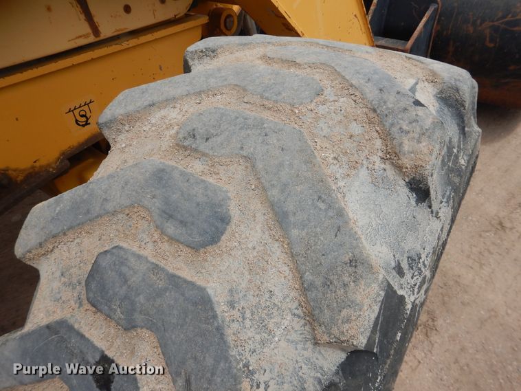 image for item DL0281 2003 John Deere 710G  backhoe