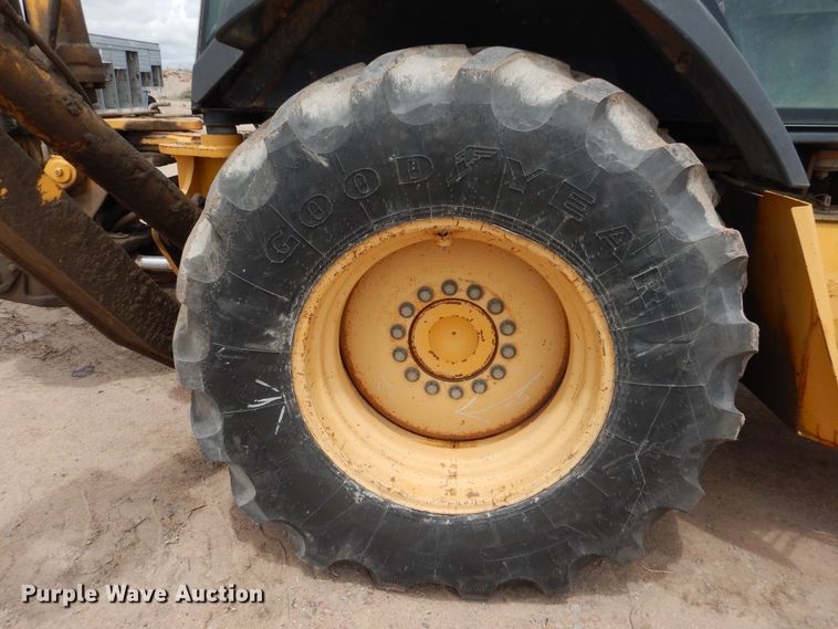 image for item DL0281 2003 John Deere 710G  backhoe