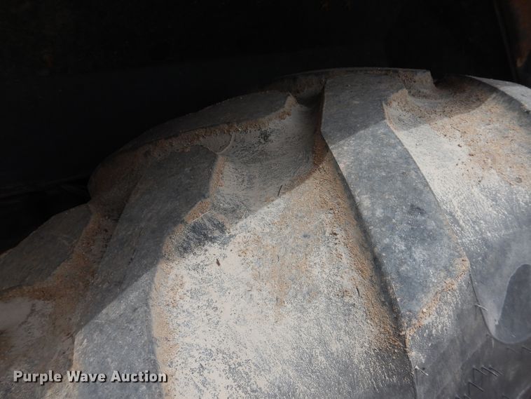 image for item DL0281 2003 John Deere 710G  backhoe