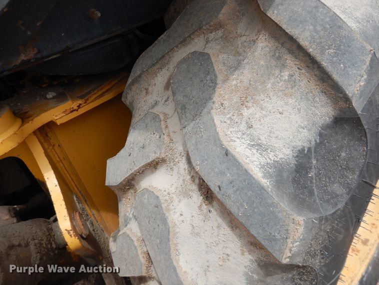 image for item DL0281 2003 John Deere 710G  backhoe