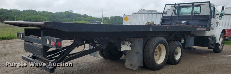image for item DI5163 1999 International 4700  rollback truck