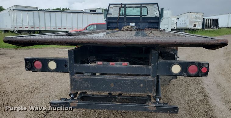 image for item DI5163 1999 International 4700  rollback truck