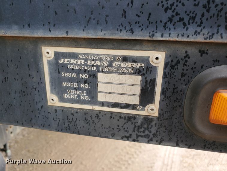 image for item DI5163 1999 International 4700  rollback truck