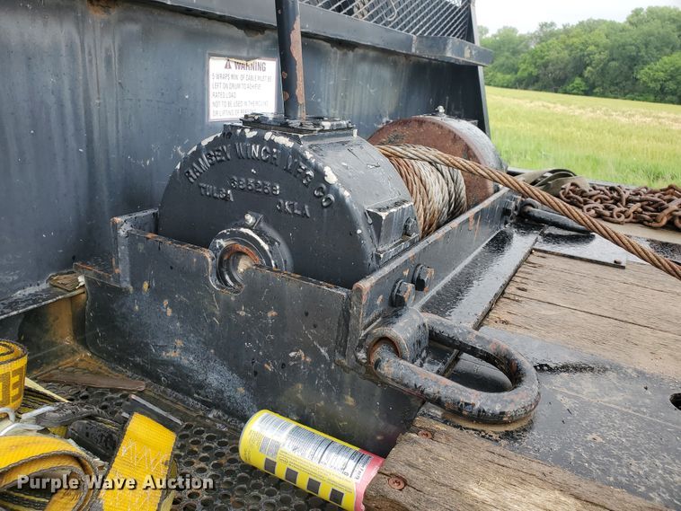 image for item DI5163 1999 International 4700  rollback truck