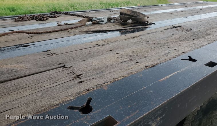 image for item DI5163 1999 International 4700  rollback truck