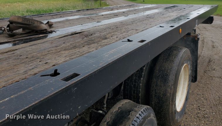 image for item DI5163 1999 International 4700  rollback truck