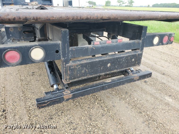 image for item DI5163 1999 International 4700  rollback truck