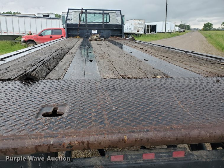 image for item DI5163 1999 International 4700  rollback truck