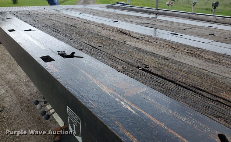 image for item DI5163 1999 International 4700  rollback truck