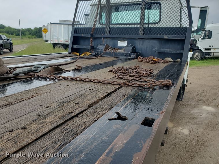 image for item DI5163 1999 International 4700  rollback truck