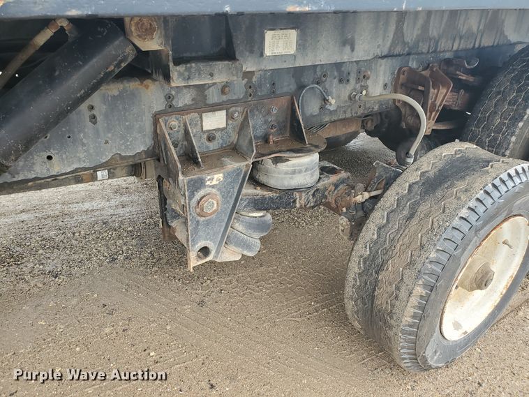 image for item DI5163 1999 International 4700  rollback truck